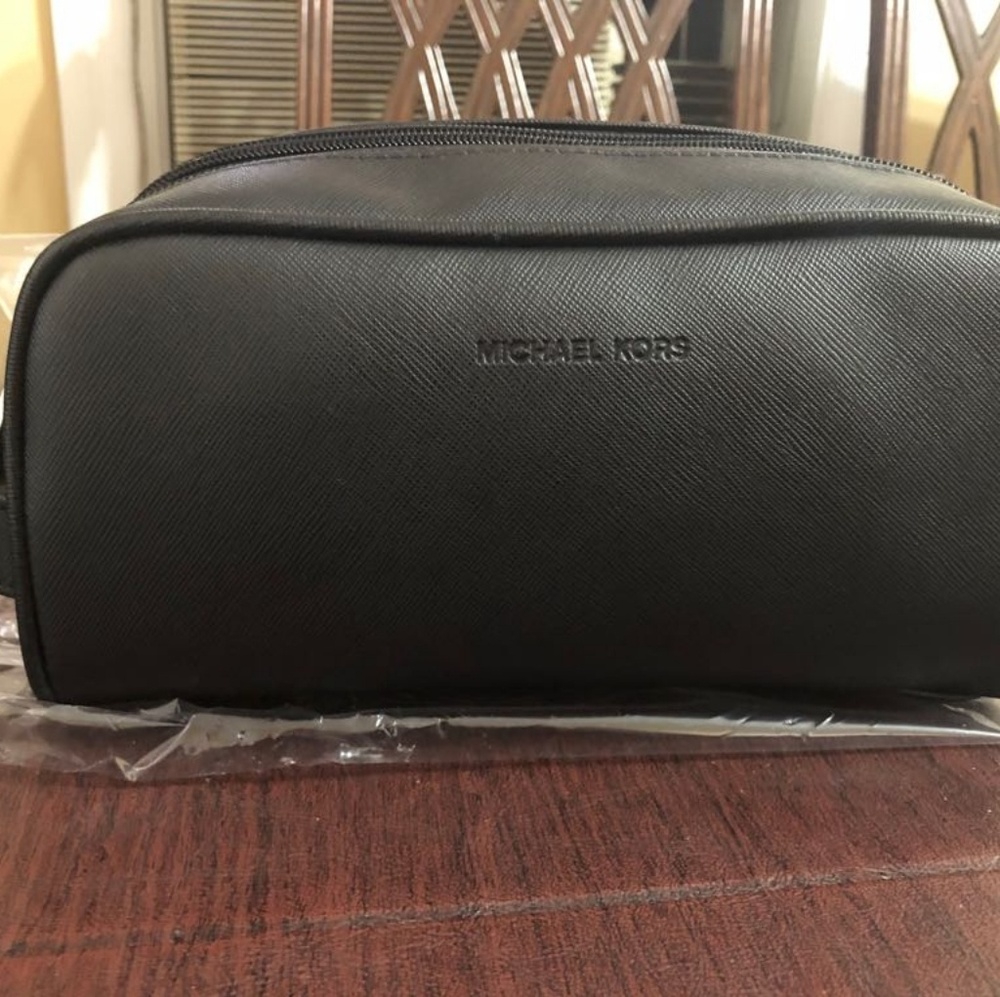 Michael Kors dopp kit.